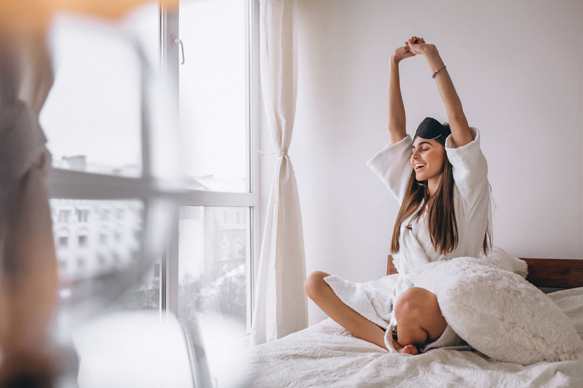 woman-bed-wearing-sleeping-mask